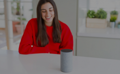Young Woman in Red with Voice Assistant